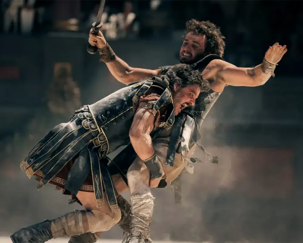 escena de la película Gladiador 2, Pedro Pascal y Paul Mescal luchando en el Coliceo