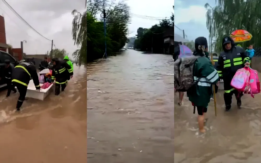 temporal en escobar Calles anegadas por el temporal y bomberos evacuando a personas en botes