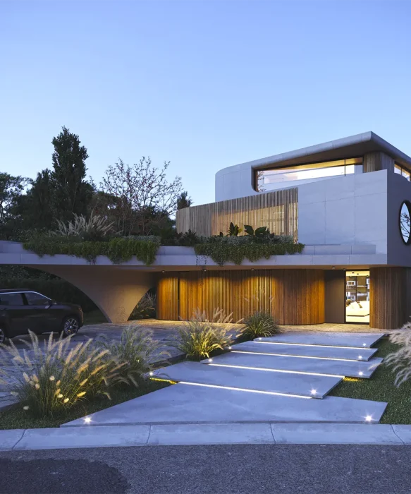 Fachada de la vivienda de lujo en Oriillas House.